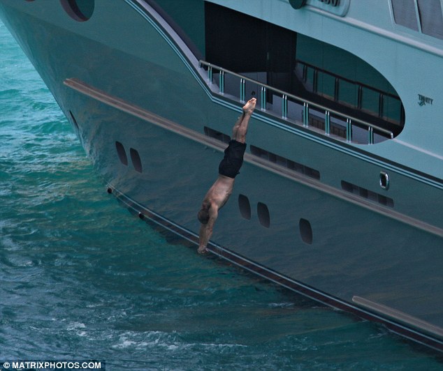 jason statham dives off superyacht Destination Fox Harb'r Too in st barts