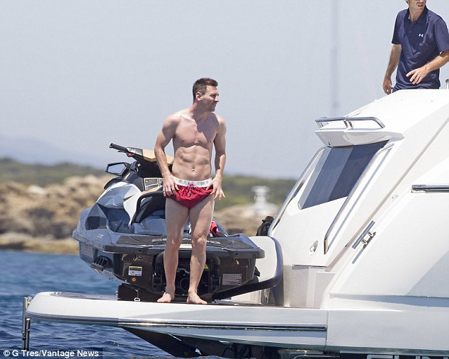 Footballer Lionel Messi  on board luxury yacht with family in ibiza in july