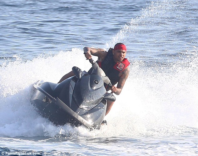 chris brown on luxury yacht vacation on HIGHLANDER in st tropez