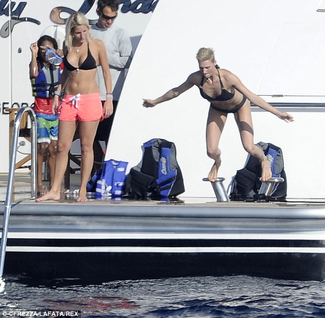 seal's new girlfriend dives off luxury yacht LADY LINDA on vacation in Sardinia