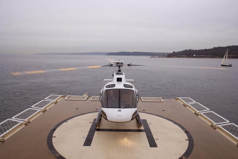 mechanic resurrection luxury yacht SuRi's helicopter on helipad