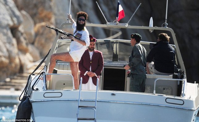 Sacha Baron Cohen with gun on board luxury yacht as 'the dictator' for cannes film festival