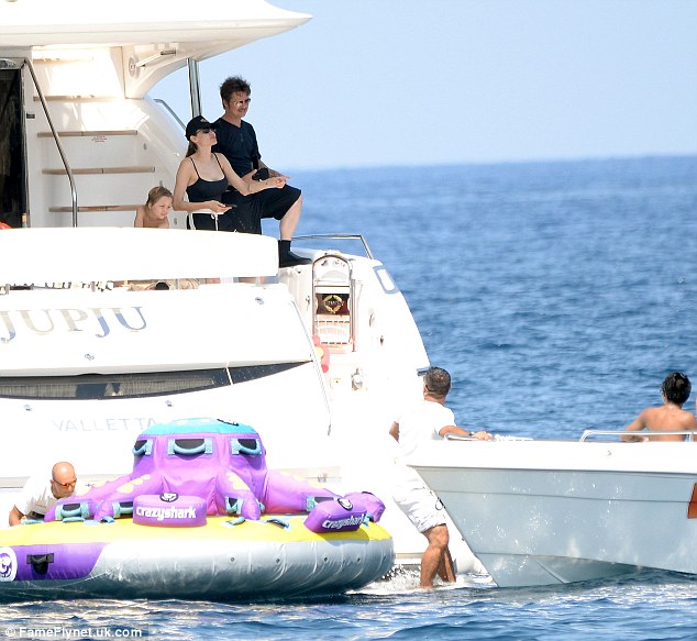 newly married angelina jolie and brad pitt looking at luxury yacht JUPJU's water toys