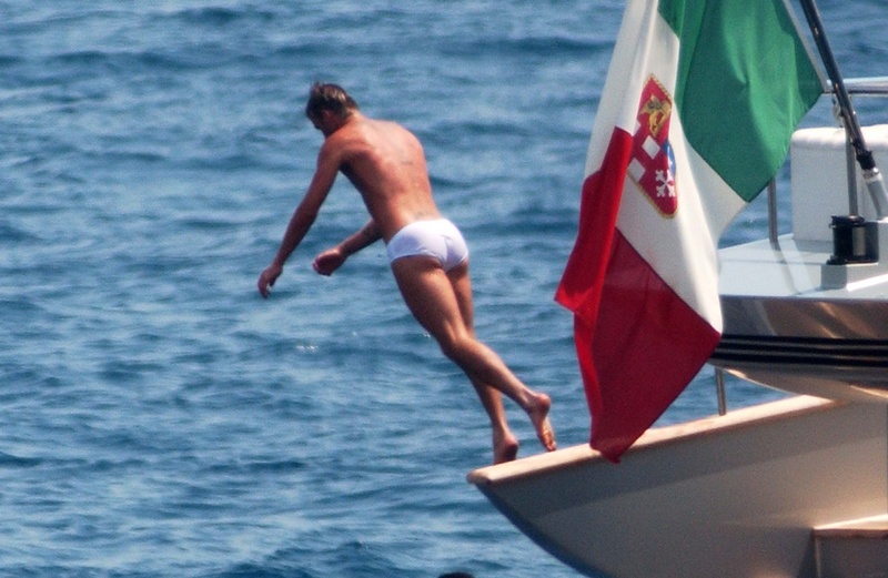 david beckham dives off robert cavalli's luxury yacht RC in italy