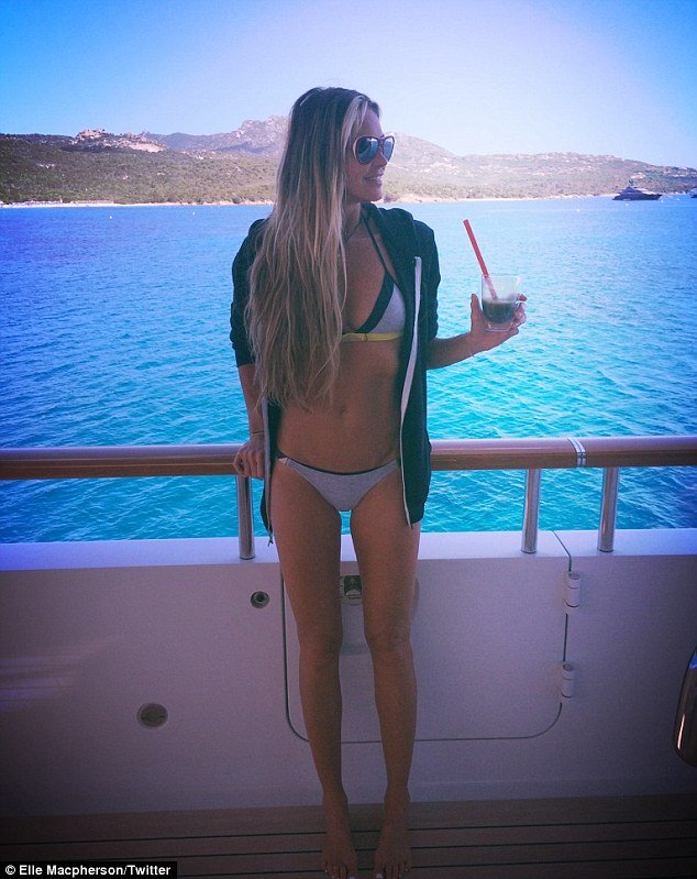 elle macpherson poses on board superyacht MADSUMMER in sardinia on vacation with husband jeffrey soffer