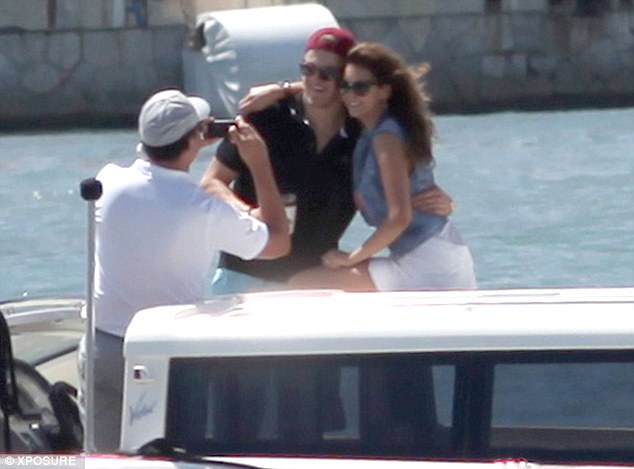 vampire diaries' actress nina dobrev and boyfriend Alexander Ludwig posing for photo on luxury yacht vacation in ibiza