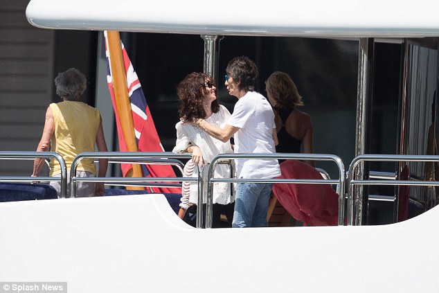 rolling stone ronnie wood and wife on board luxury yacht sovereign in sydney