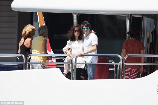 rolling stone ronnie wood and wife on board luxury yacht sovereign in sydney
