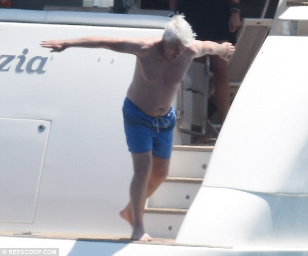 Richard Gere diving off the superyacht