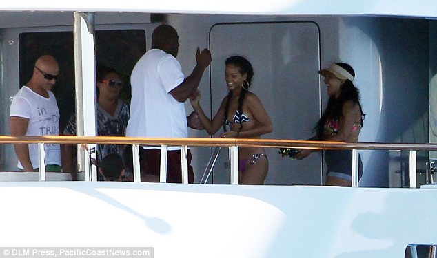 Rihanna and Magic Johnson aboard superyacht Latitude