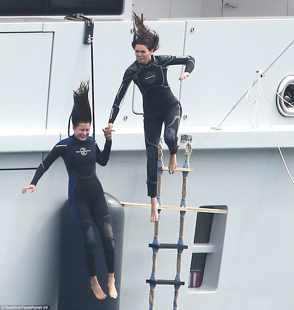 kendall jenner and bella hadid dive off superyacht axioma into water