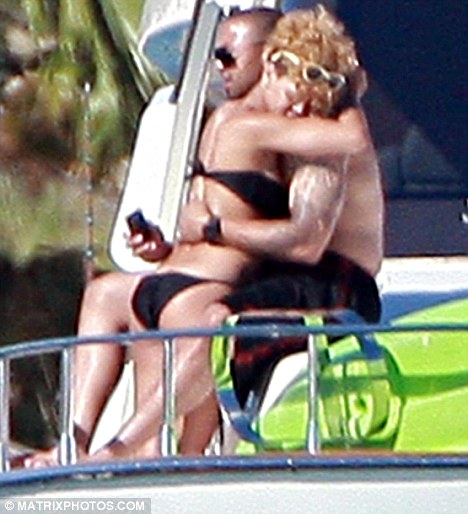 rihanna and matt kemp hugging on luxury yacht in mexico