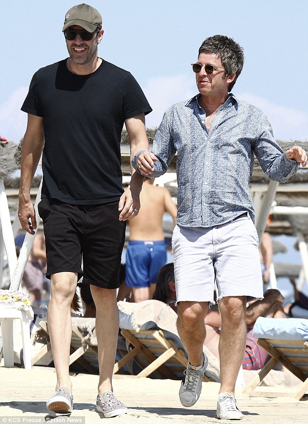 sacha baron cohen and noel gallagher on st tropez beach on yacht vacation on bono's yacht 'kingdom come'