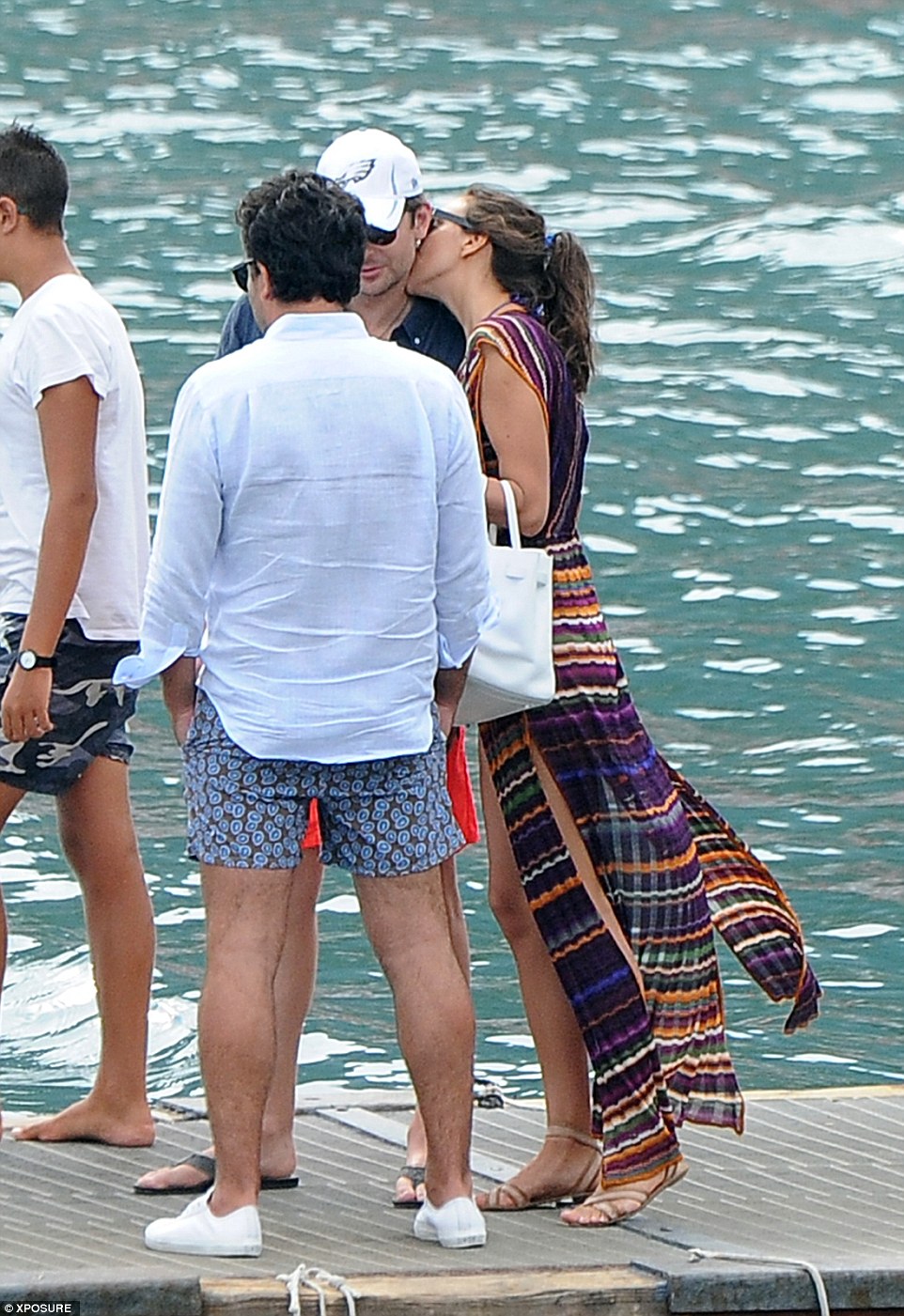 irina shayk kisses bradley cooper at harbour in italy