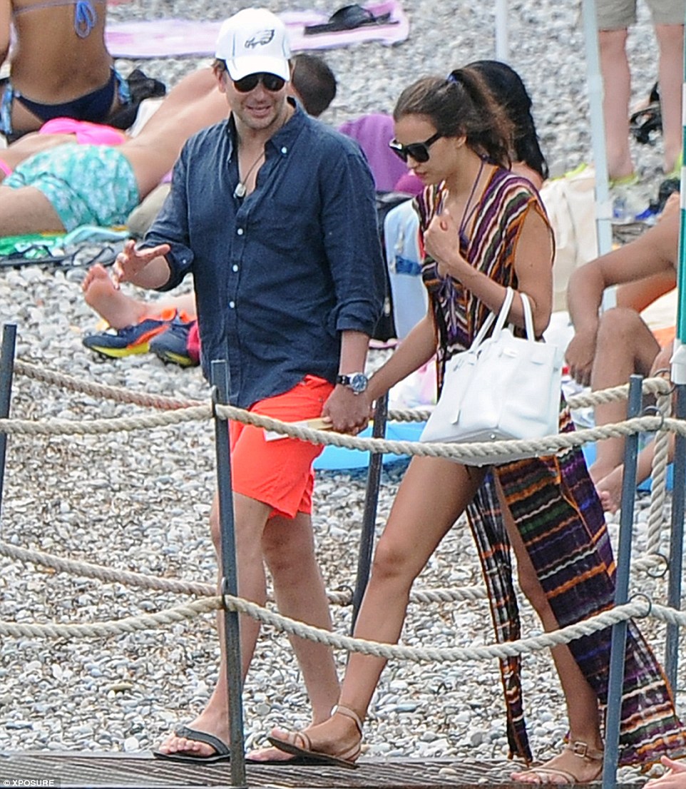 couple bradley cooper and irina shayk at harbour on holiday in italy
