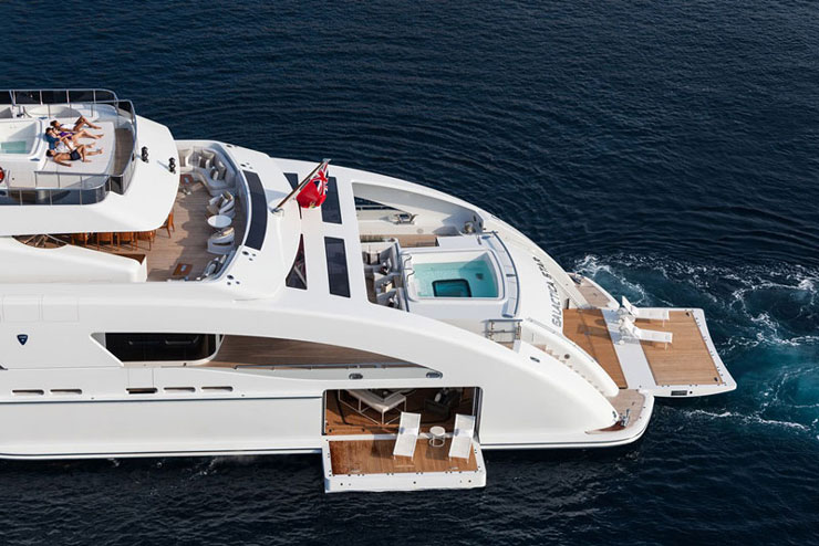 aft view of heesen motor yacht galactica star's (rented by Jay Z and Beyonce) Beach Club and fold-out balconies